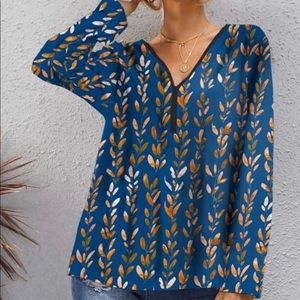 NWT Blue long-sleeve top with rust colored 🍂 leaf print and zip detail